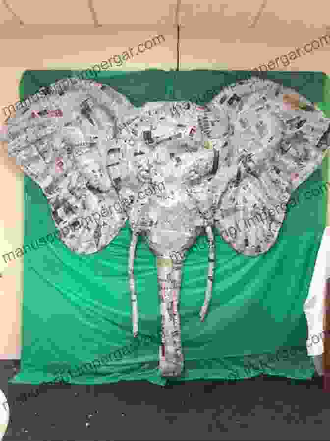 A Colorful Paper Mache Elephant With Intricate Details Hand Shadows For Kids: Make Animals With Your Hands