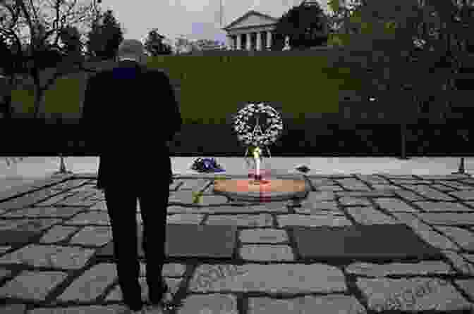 JFK Jr. Standing Solemnly At His Mother's Grave The Good Son: JFK Jr And The Mother He Loved